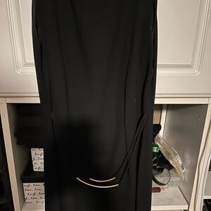 Elegant Black Dress with Gold Accents